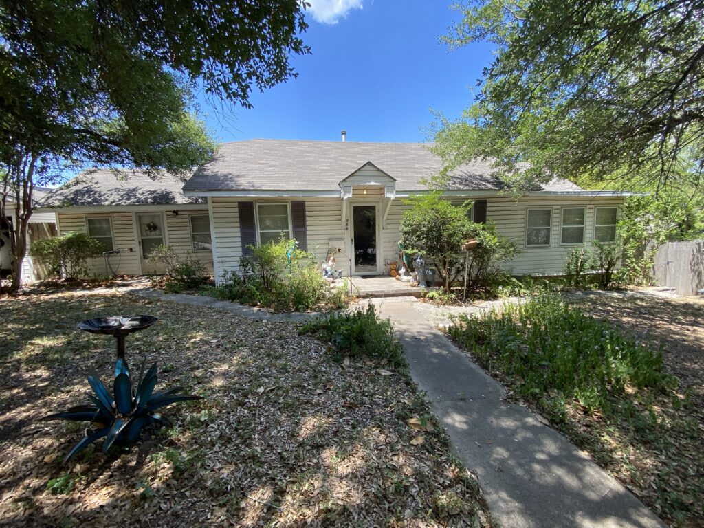 The front of a house in Fort Worth that we bought fast